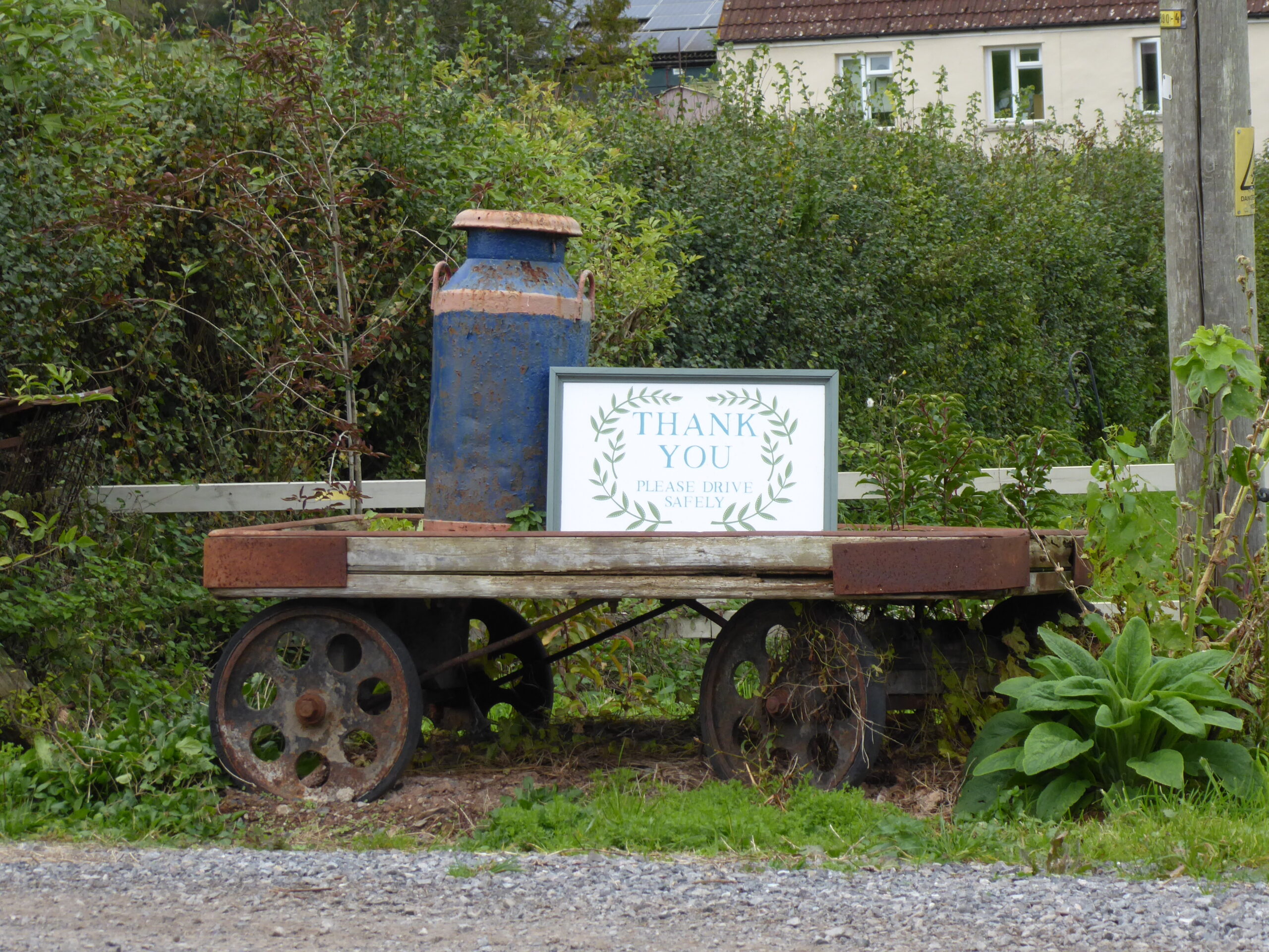 Old rail Cart and milk churn